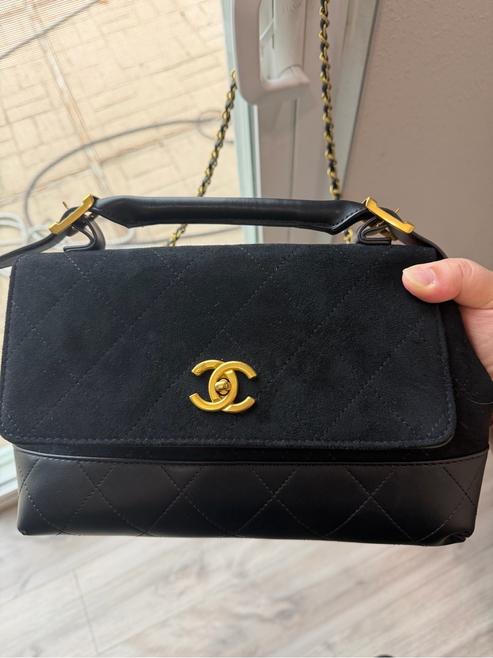 Black and gold hardware quilted crossbody